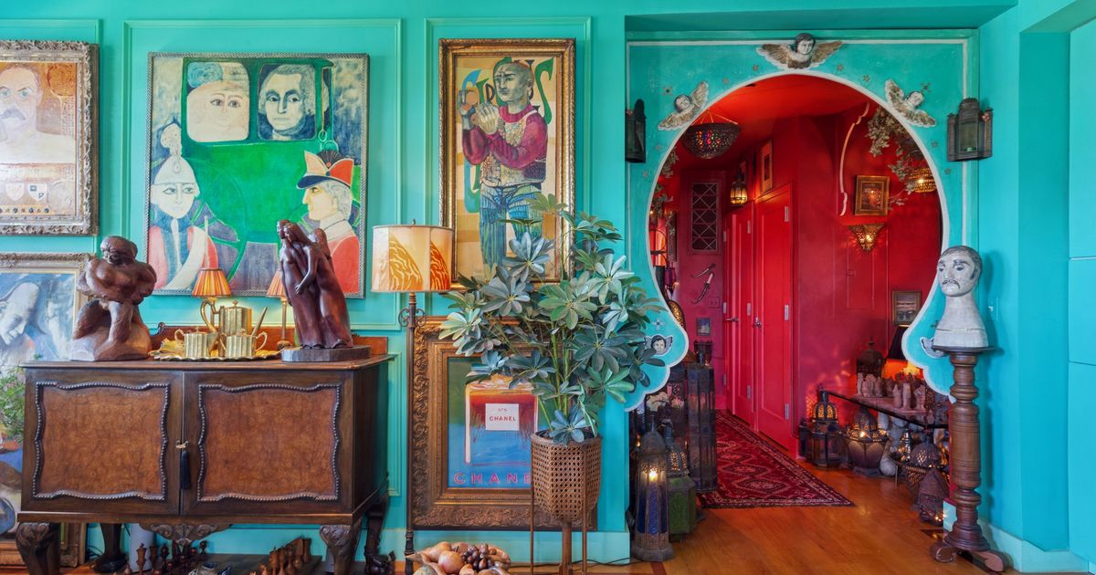 A Maximalist Condo with a Two-Storary Garden and Moorish Arch