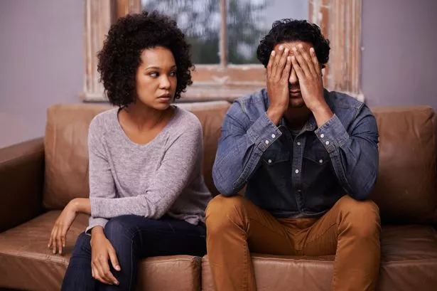 A man Looking upset During a conversation with a Woman