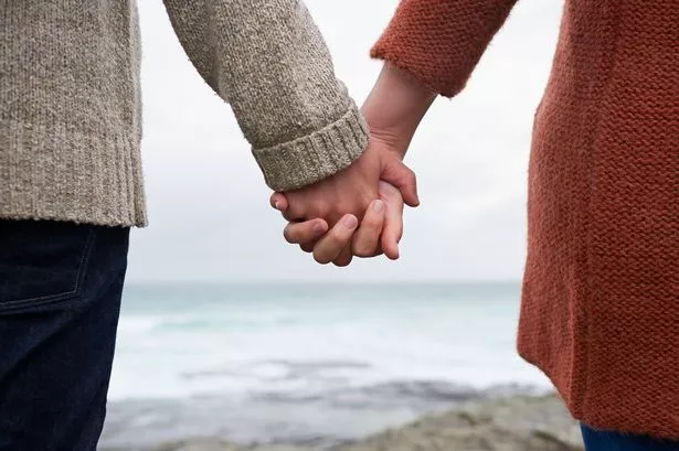 Close-up of Couple Holding Hands