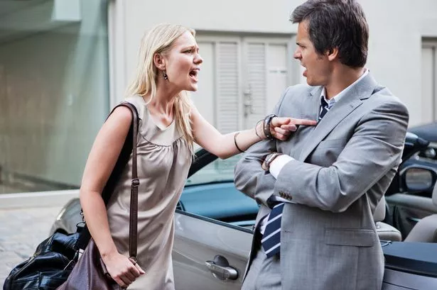A man and woman arguing