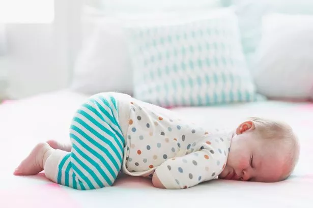 Does Your Baby Sleep in this Position? (Stock)