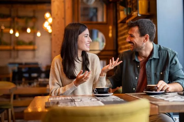 A couple at a coffee shop