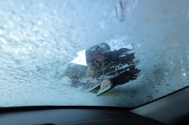 Snow has been covers Cars Around the UK Recently (File)