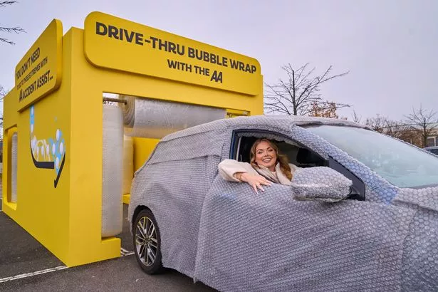 Scarlett Moffatt spotted testing a tongue-in-cheek Drive-Thru Bubble Wrap