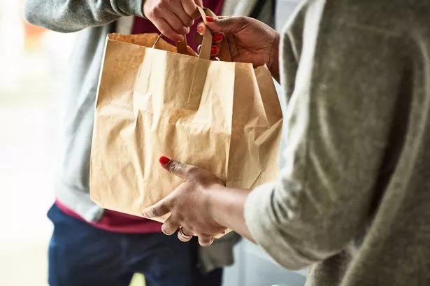 Woman Holding Paper Bag With Out Food, Home Delivery, Food Order, Takeaway