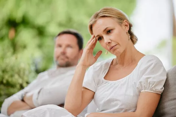 Matre Woman Looking Upseset and Annoyed AFTER AGUING WITH HER HUSBAND ABOUT MARRIAGE PROBLEMS