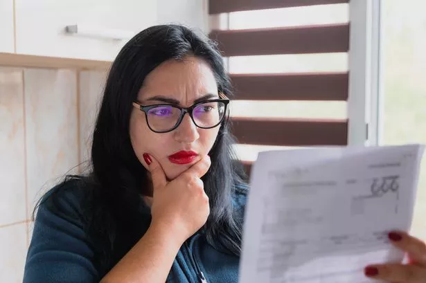 Person Concerned About Their Bills