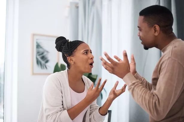 A woman and a man arguing