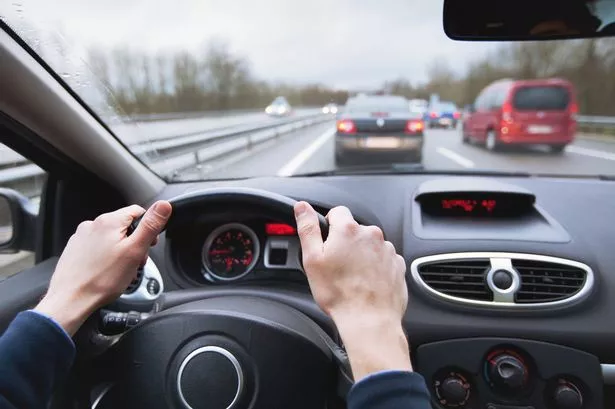 Driving Tsar on Highway, Close Up of Hands On Steering Wheel