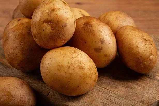RAW POTATOES, SCATTERED ON A Chopping Board, Close-up, No People,