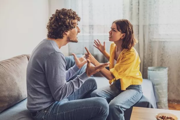 A man and woman arguing