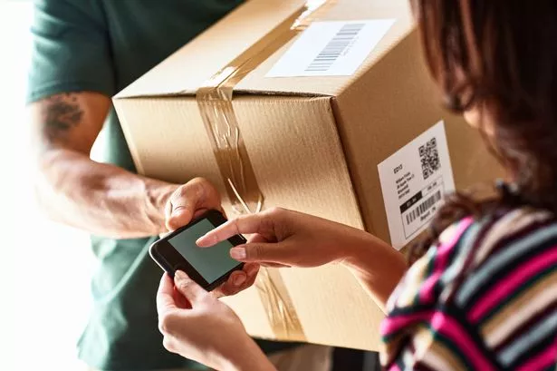 Courier Handing Over Package Ascing Female Customer to DO Electronic Signature, Delinarying, Receiving, Efficency