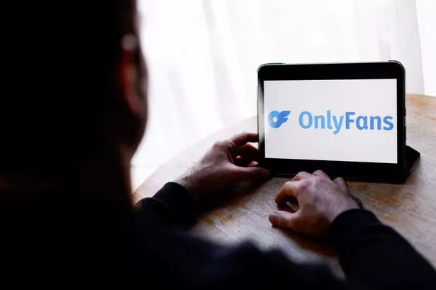 The Onlyfans Logo is Displayed on a tablet 