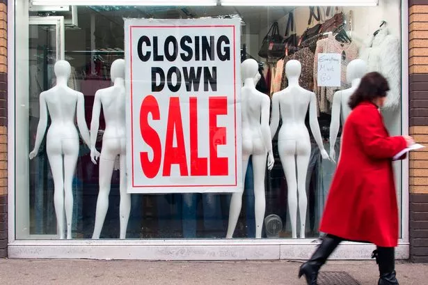 A CLOING DOWN SALE SIGN IN A SHOP Window in Oxford High Street. (Photo By: Loop Images/Uig Via Getty Images)