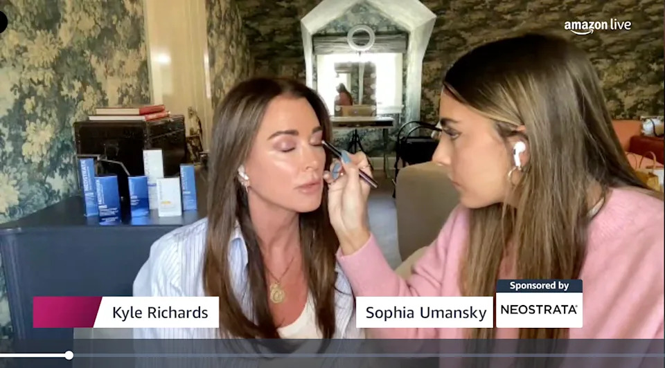 Kyle Richards tries a Julep eyeshadow.