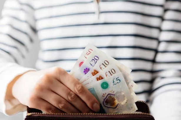 Person counting money