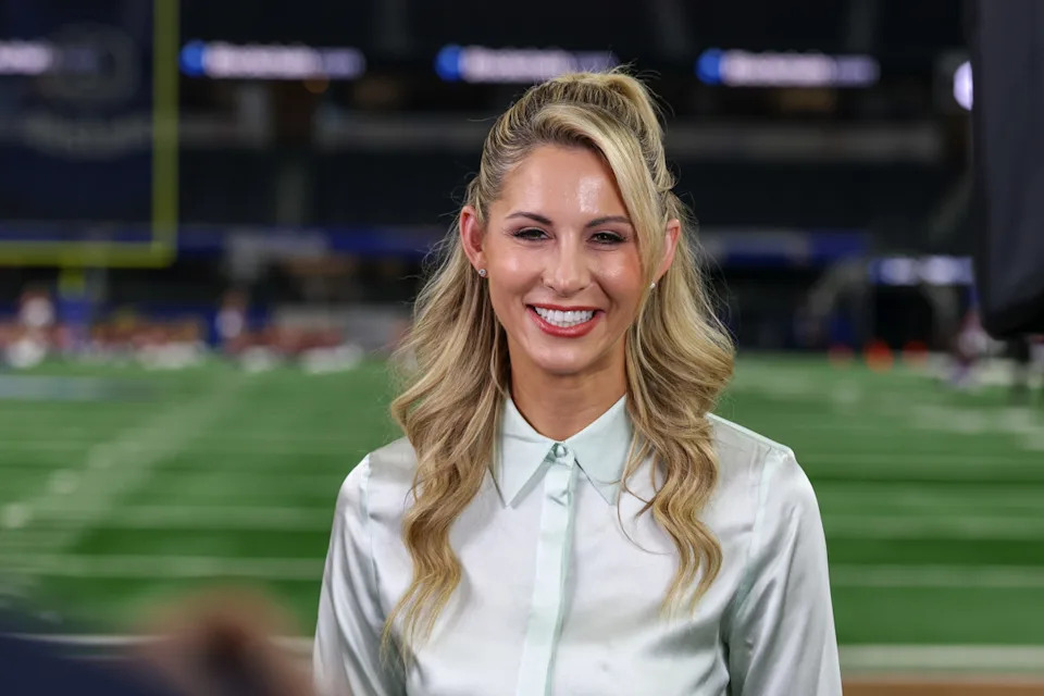 ARLINGTON, TX - JANUARY 10: ESPN reporter Laura Rutledge on the field before the Ohio State Buckeyes versus Texas Longhorns College Football Playoff Semifinal at the Cotton Bowl Classic on January 10, 2025, at AT&T Stadium in Arlington, TX. (Photo by David Buono/Icon Sportswire via Getty Images)Icon Sportswire/Getty Images
